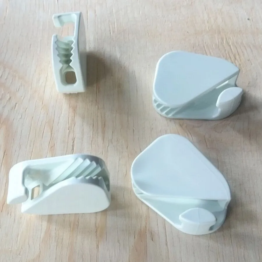 Tinklo įtempimo fiksatorius